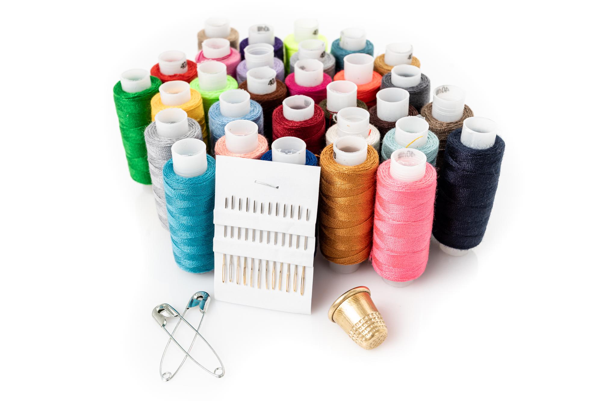 Stack of embroidered samples on a table